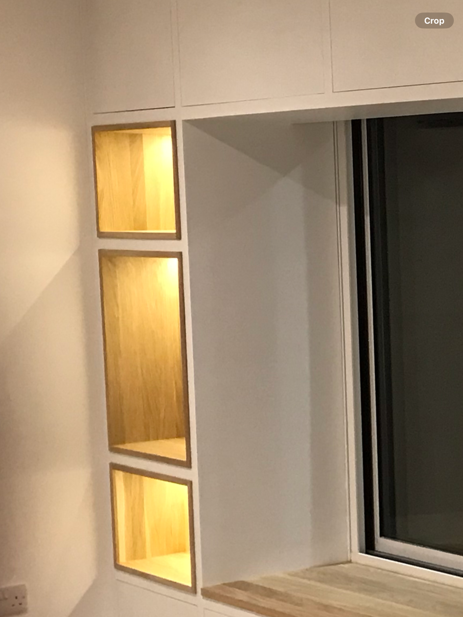 Integrated lighting installed in a bespoke media unit in Ipswich