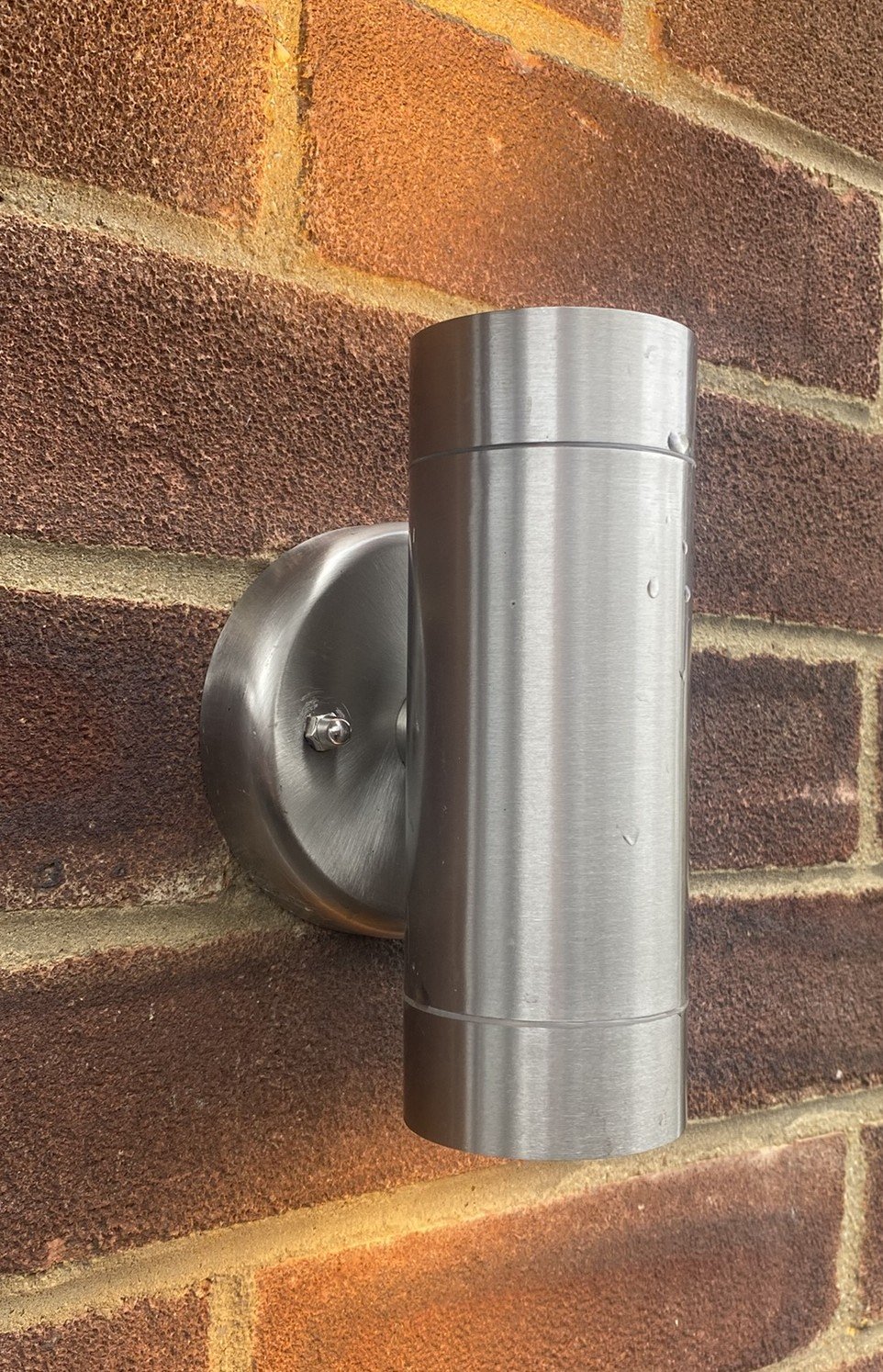 Stainless steel outdoor wall light installed in Ipswich